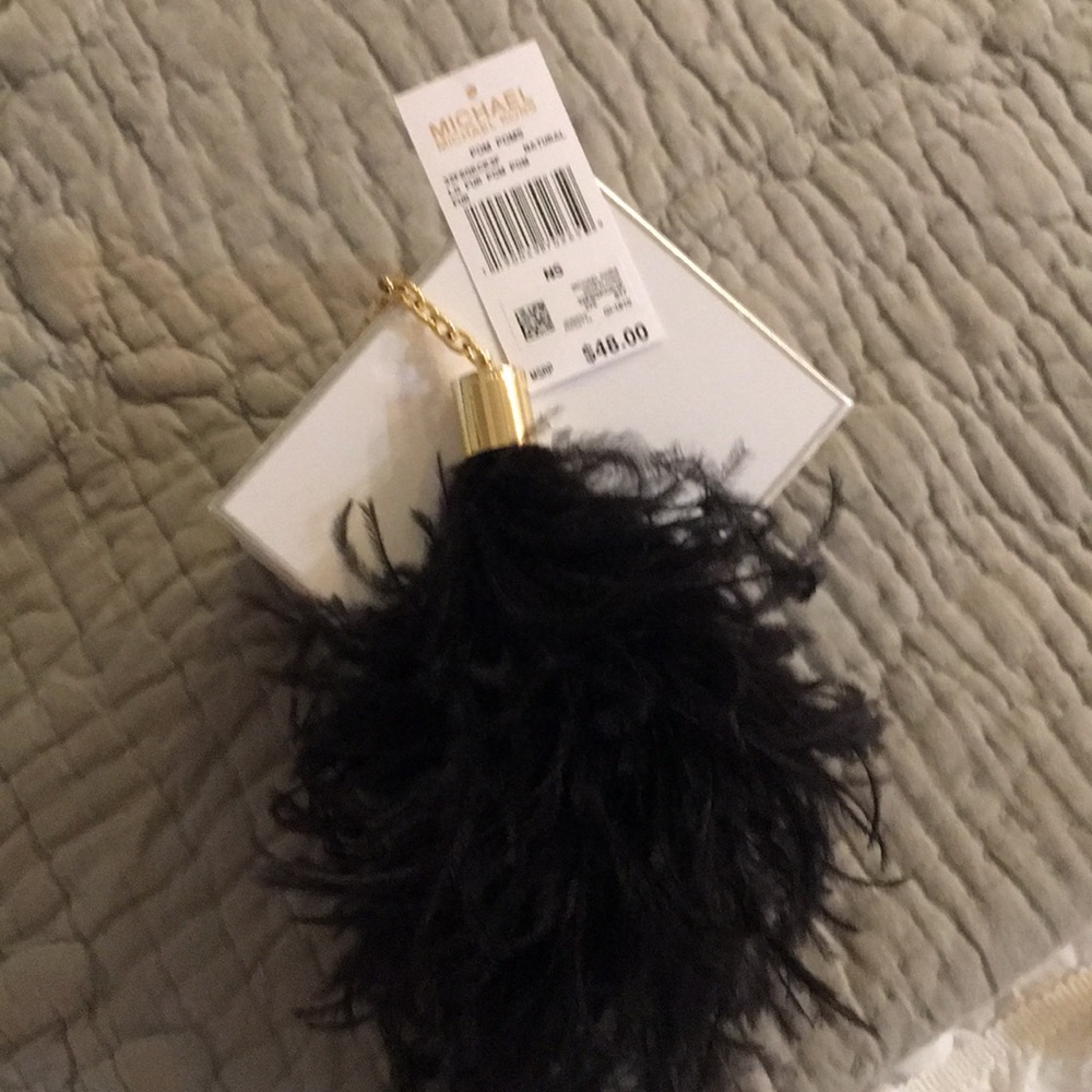 Michael Kors key chain with feathers